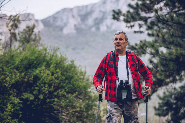 istock Senior hiker on high mountain 962650740