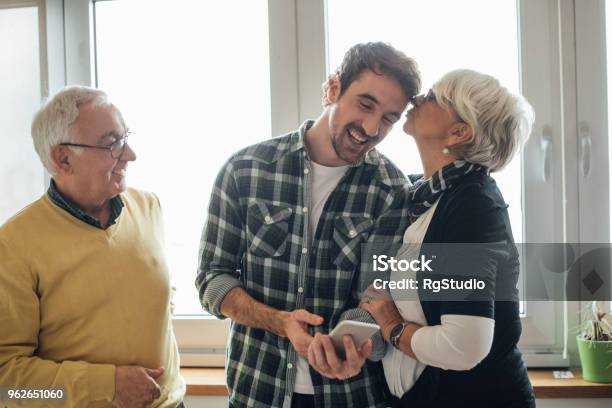 Son With His Parents Stock Photo - Download Image Now - Parent, Son, Mother