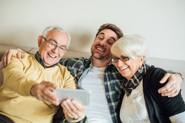 istock Happy family taking selfie together 962651126