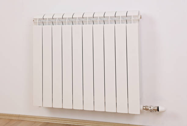 istock Home heating concept. White radiator close up 962655004