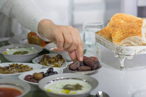 Ramadan ramadan food and praying woman middle eastern food photos stock pictures, royalty-free photos & images