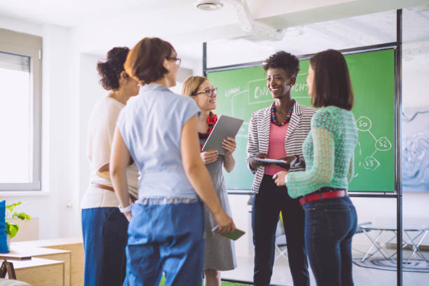 istock Businesswomen working together 962668658