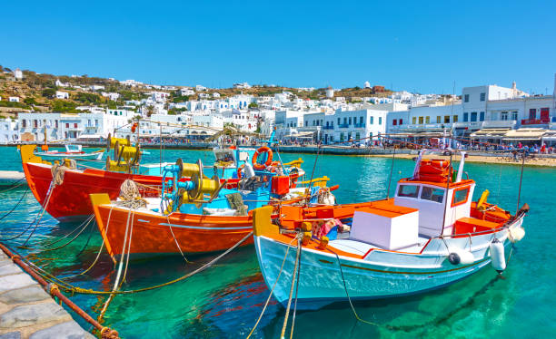 Port with old fishing boats Port with old fishing boats and the waterfront in Mykonos Islang, Greece mykonos photos stock pictures, royalty-free photos & images