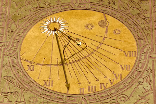 Close view of a sundial as an exterior in Warsaw old town (Poland).