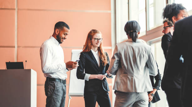 istock Conference room with business people on coffee break 962688218