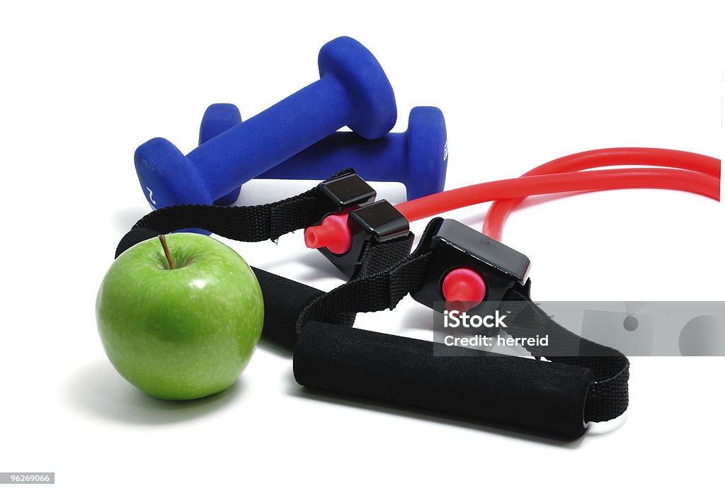 Resistance Band, Blue Weights and Green Apple  Anaerobic Exercise Stock Photo
