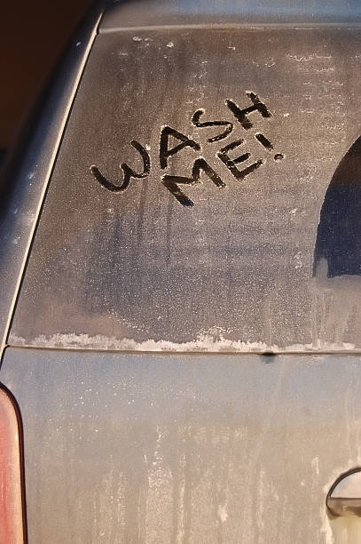 istock Dirty car with wash me on rear window 96269095