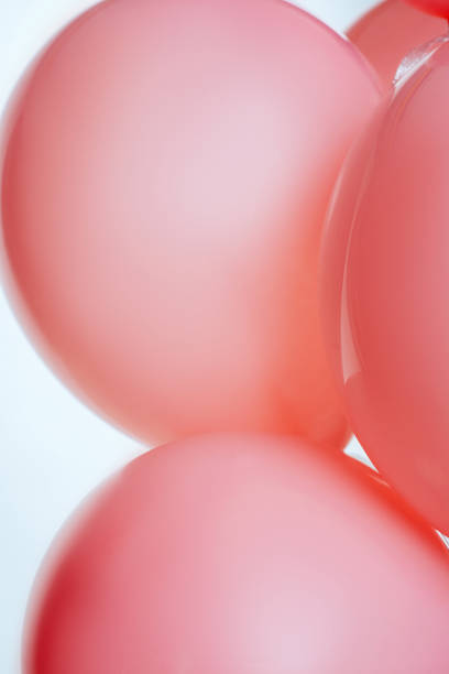istock Pink flying balloon isolated 962692198