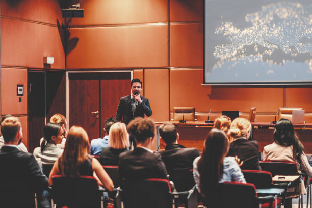 istock Public speaker at marketing seminar 962695626