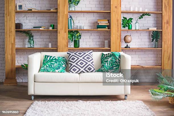 Cozy Light Room With Plants White Sofa And Stylish Furniture In Scandinavian Style Living Room Interior Concept Selective Focus Space For Text Stock Photo - Download Image Now