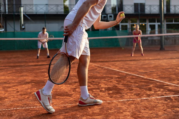 tennis player serving outdoor