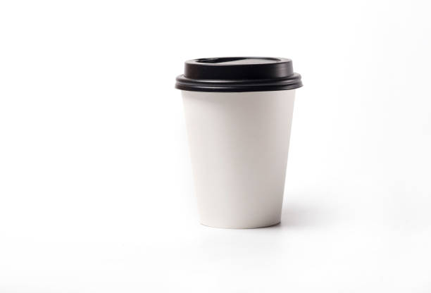 istock Isolate of a paper cup for coffee with a dark lid 962701084