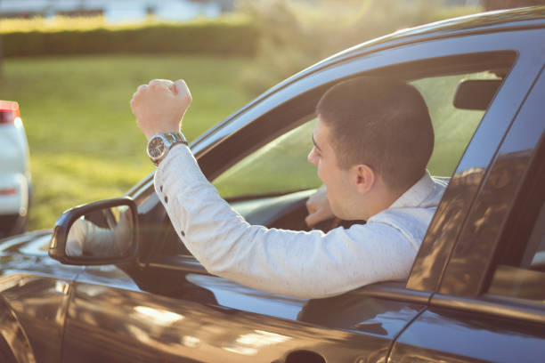 istock Nervous young businessman is stuck in traffic 962702596