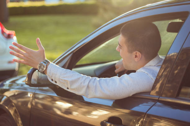 istock Nervous young businessman is stuck in traffic 962705084