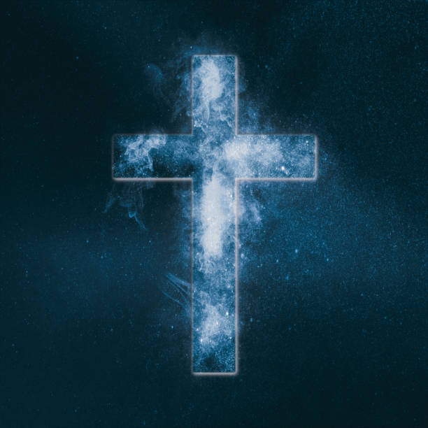istock Christian cross symbol. Abstract night sky background. 962705814