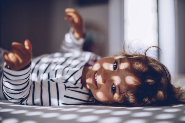 istock Girl lying in bed 962708970
