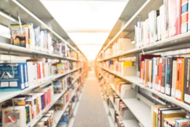istock Abstract blurred background of modern public library in America 962709702