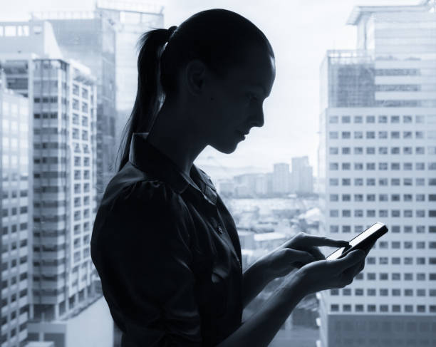 istock Business woman using smart phone mobile. 962714018