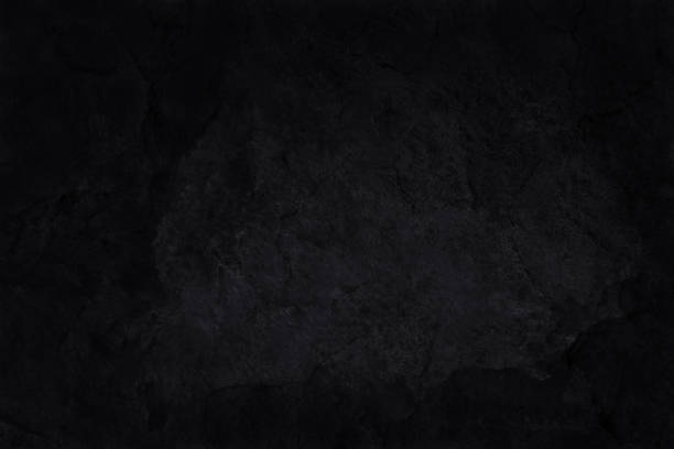 istock Dark grey black slate texture in natural pattern with high resolution for background and design art work. Black stone wall. 962714532