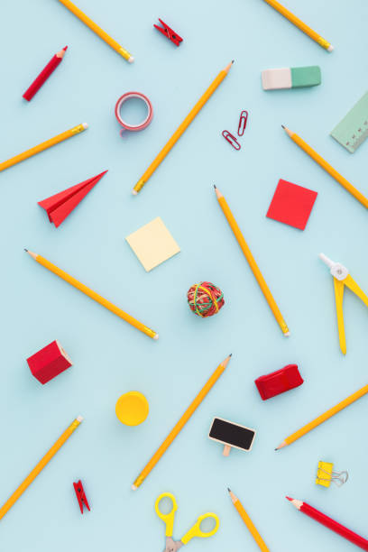 istock Mixed school supplies on blue background. 962717436