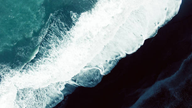 istock Aerial view on black sand beach 962717530