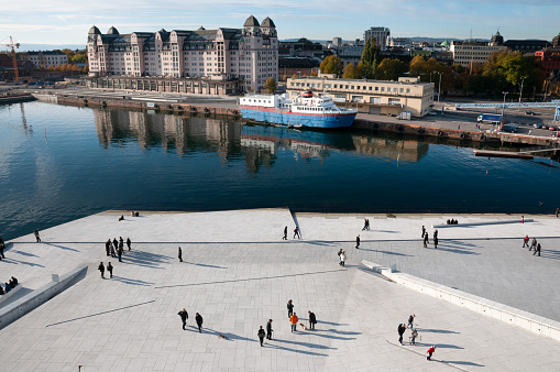 People walking in peace Opera house of Oslo