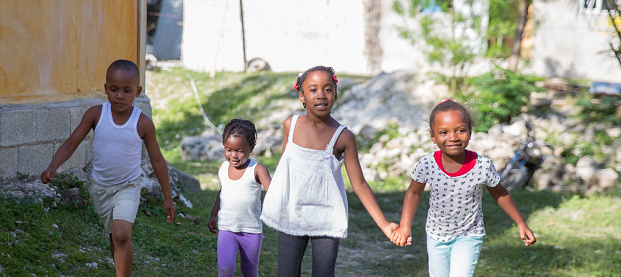 A group of young Jamaican children playing in Saint Irwin, Jamaica. Shot with Canon 5D Mark lll.