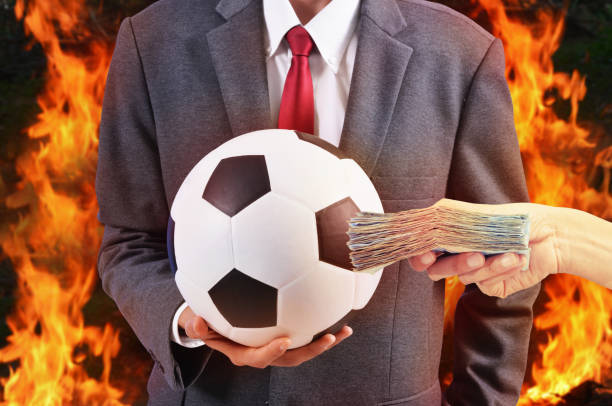 man hold football