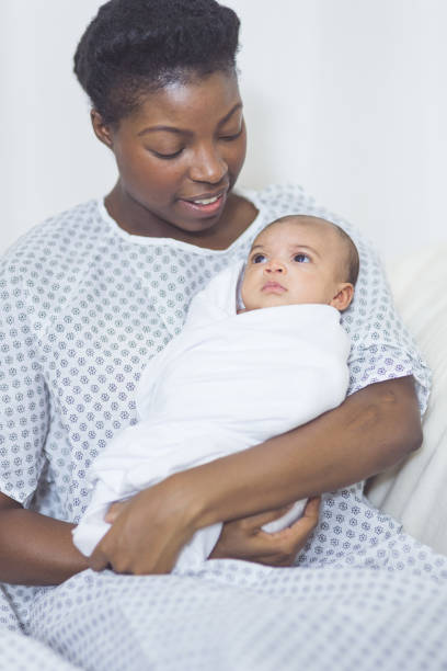 istock New Mom Holds Her Infant to Her Chest 962730586