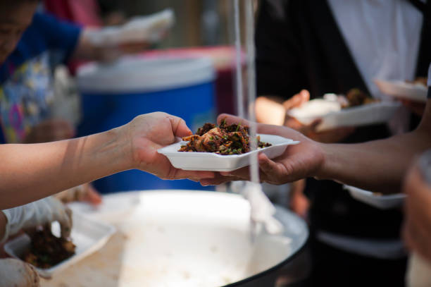 istock Feeding the poor Helping each other in society 962734718