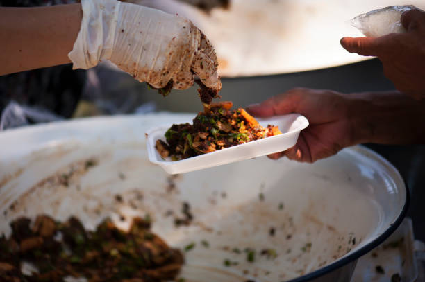 istock Feeding the poor Helping each other in society 962734778