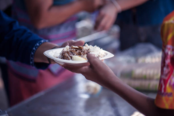 istock Feeding the poor Helping each other in society 962734880
