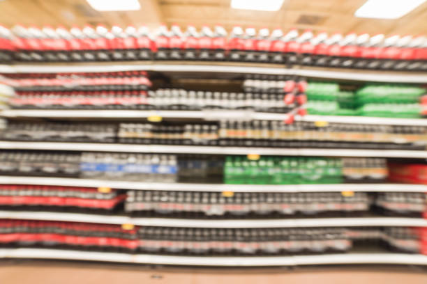 istock Abstract blurred background soft drinks aisle in American store 962740638