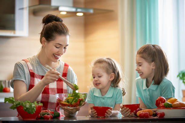 istock Happy family in the kitchen. 962746520