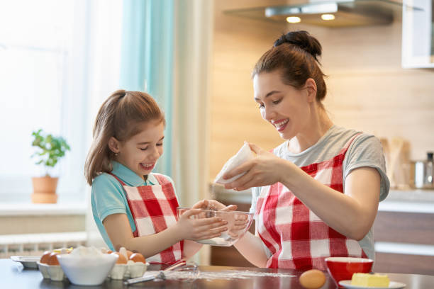 istock Happy family in the kitchen. 962746552