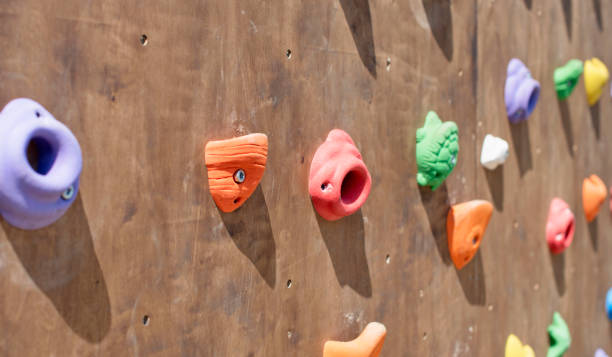 istock Banner Wooden wall for climbing close up. 962752392