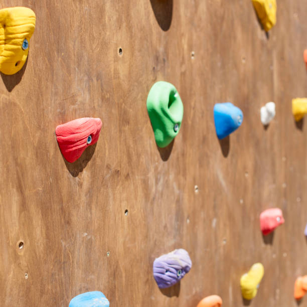 istock Wooden wall for climbing close up. 962752410