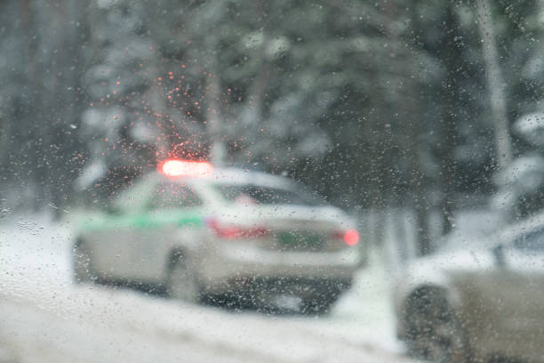 istock Police car with flashing beacon 962752414