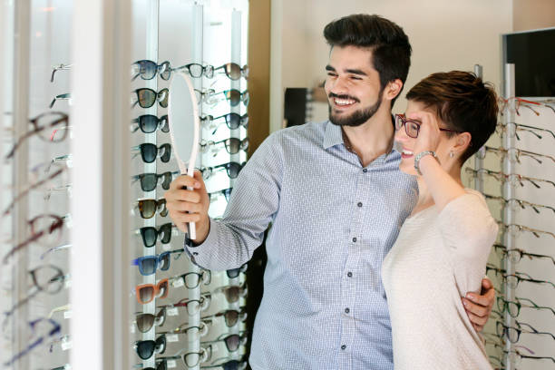 istock Young couple in an eyewear store 962758794