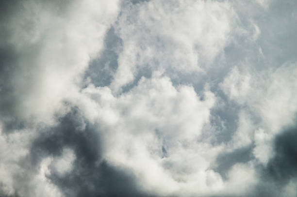 istock background with clouds on blue sky in bad weather 962764684