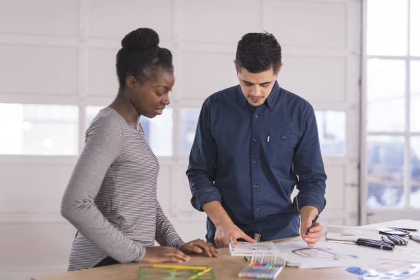 istock Design partners strategize in their modern studio 962768818