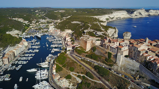 Port de Soller, Mallorca, Spain - July 19, 2013: View from the sea of the city, yachts, beach, streets, hotels.