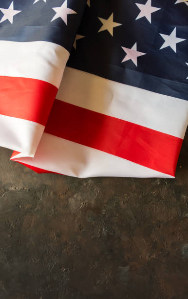 istock American flag on a stone background. 962775980