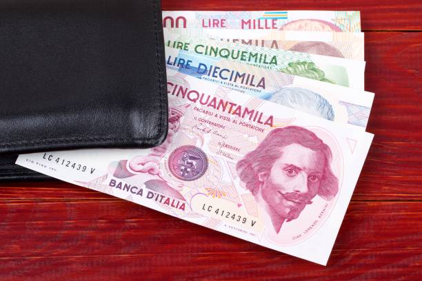 istock Money from Italy in the black wallet 962777192