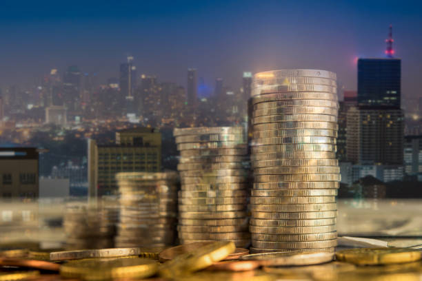 istock Double exposure of stack coins with city night 962778068