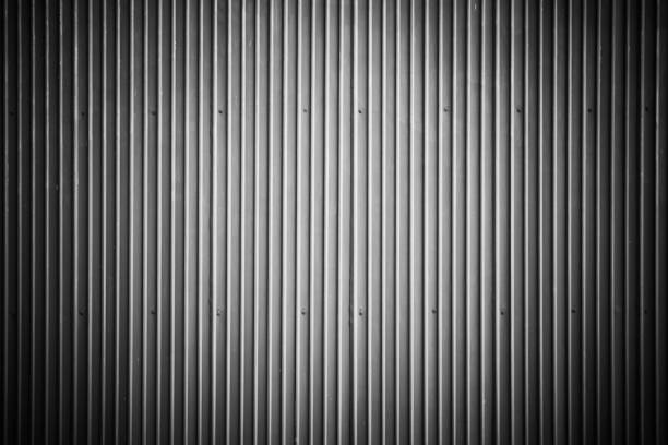 istock Black and white corrugated metal sheet wall, Backgrounds 962778404