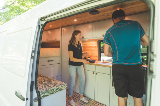 istock Millennial couple living in a van 962781930