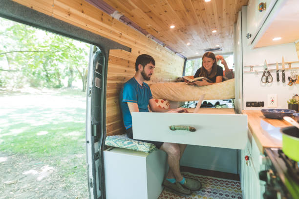 istock Millennial couple living in a van 962781958