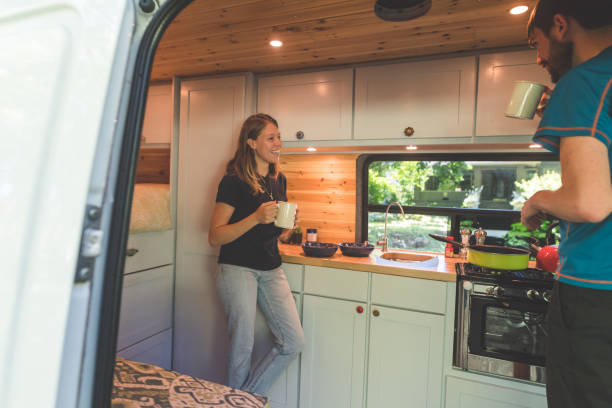 istock Millennial couple living in a van 962781984