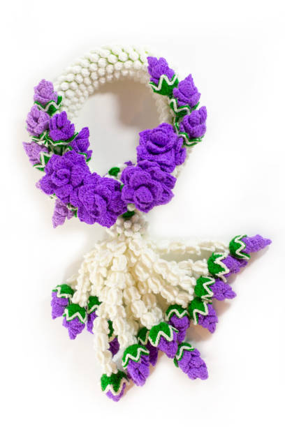 Violet Knitted wool Thai traditional garland. Artificial garland flower. stock photo